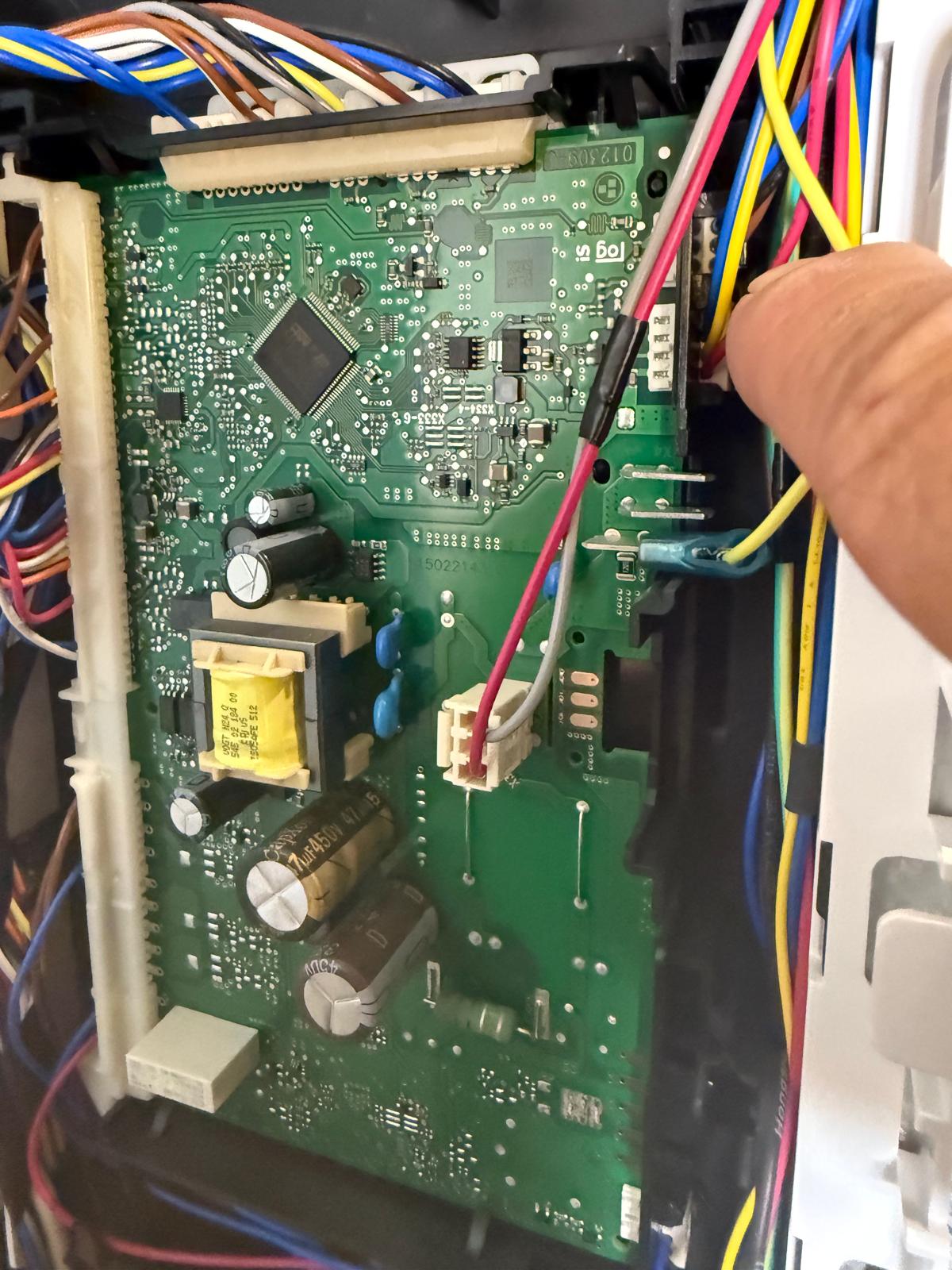 Appliance control board with wiring harness connections
