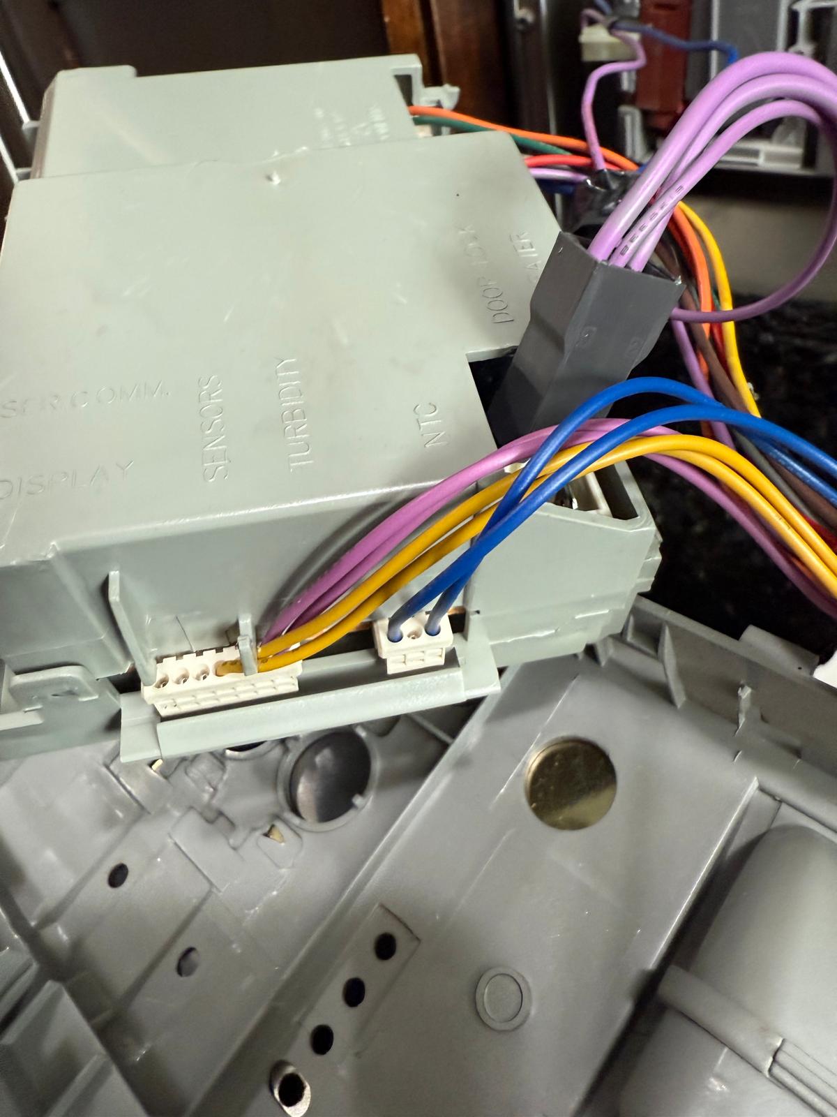 Washer control module wiring harness during service